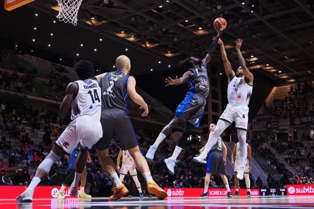 BASKET - Coppa Italia - Frecciarossa Final Eight 2025 - Germani Brescia vs Bertram Derthona Tortona Justin Gorham (Bertram Derthona Tortona) thwarted by Maurice Daly Ndour (Germani Brescia) during Frecciarossa Final Eight 2025 - Germani Brescia vs Bertram Derthona Tortona , Italian Basketball Cup Men match in Turin, Italy, February 12 2025 Turin Italy  Copyright: xIPAxSport ABACAx