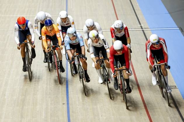 Sport Bilder des Tages HEUSDEN-ZOLDER - Yoeri Havik (left in orange) in action on the waste race during the first day of the European Track cycling, Rad, Radsport, Bahnrad, Bahn championships in Belgium. ANP BAS CZERWINSKI xVIxANPxSportx xxANPxIVx 519814550 originalFilename: 519814550.jpg