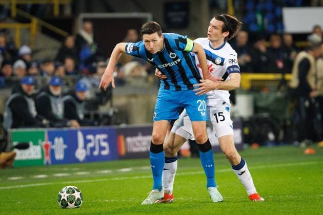 Club s Hans Vanaken and Atalanta s Marten de Roon fight for the ball during a soccer game between Belgian soccer team Club Brugge KV and Italian club Atalanta Bergamo, on Wednesday 12 February 2025 in Brugge, in the first leg of the Knockout phase play-offs of the UEFA Champions League competition. KURTxDESPLENTER  x112325293x