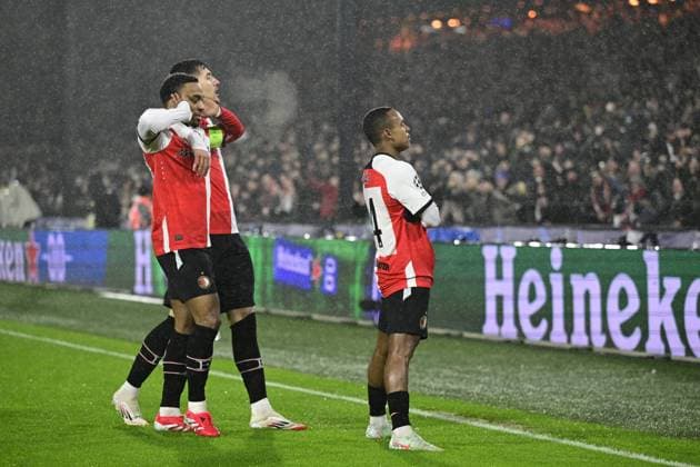 ROTTERDAM - (l-r) Quinten Timber of Feyenoord, Jakub Moder of Feyenoord, Igor Paixao of Feyenoord celebrate 1-0 during the UEFA Champions League playoff match between Feyenoord and AC Milan at Feyenoord Stadion de Kuip on Feb. 12, 2025 in Rotterdam, Netherlands. ANP OLAF CRACK UEFA Champions League 2024 25 League Knockout Play-off First Leg 2024 25 xVIxANPxSportx xxANPxIVx 519820578 originalFilename: 519820578.jpg