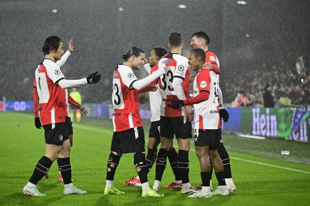 ROTTERDAM - (l-r) Ayase Ueda of Feyenoord, Anis Hadj Moussa of Feyenoord, Quinten Timber of Feyenoord, David Hancko of Feyenoord, Igor Paixao of Feyenoord, Jakub Moder of Feyenoord celebrate 1-0 during the UEFA Champions League playoff match between Feyenoord and AC Milan at Feyenoord Stadion de Kuip on Feb. 12, 2025 in Rotterdam, Netherlands. ANP OLAF CRACK UEFA Champions League 2024 25 League Knockout Play-off First Leg 2024 25 xVIxANPxSportx xxANPxIVx 519820737 originalFilename: 519820737.jpg