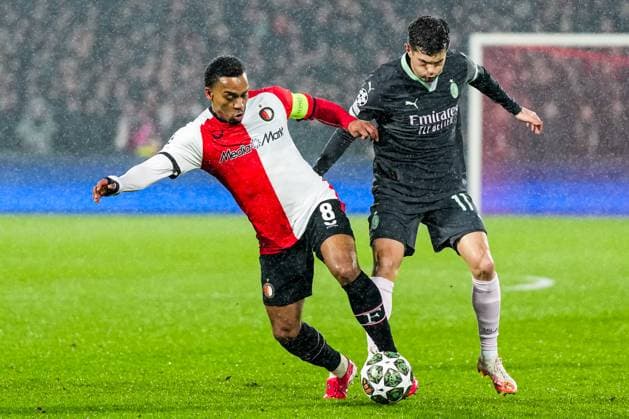 UEFA Champions League: Feyenoord v AC Milan Rotterdam - Quinten Timber of Feyenoord, Christian Pulisic of AC Milan during the 1st leg of the knockout phase play-offs of new format of the Champions League 2024 2025. The match is set between Feyenoord and AC Milan at Stadion Feijenoord De Kuip on 12 February 2025 in Rotterdam, The Netherlands. Copyright: xYannickxVerhoevenx
