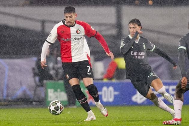 2025-02-12 Feyenoord v AC Milan - UEFA Champions League 2024 25 League Knockout Play-off First Leg ROTTERDAM, NETHERLANDS - FEBRUARY 12: Jakub Moder of Feyenoord battles for possession with Joao Felix of AC Milan during the UEFA Champions League 2024 25 League Knockout Play-off First Leg match between Feyenoord and AC Milan at Stadion Feijenoord on February 12, 2025 in Rotterdam, Netherlands. Rotterdam Stadion Feijenoord Netherlands Content not available for redistribution in The Netherlands directly or indirectly through any third parties. Copyright: xJorisxVerwijstx