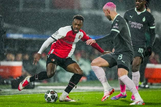 UEFA Champions League: Feyenoord v AC Milan Rotterdam - Antoni Milambo of Feyenoord, Theo Hernandez of AC Milan during the 1st leg of the knockout phase play-offs of new format of the Champions League 2024 2025. The match is set between Feyenoord and AC Milan at Stadion Feijenoord De Kuip on 12 February 2025 in Rotterdam, The Netherlands. Copyright: xTomxBodex