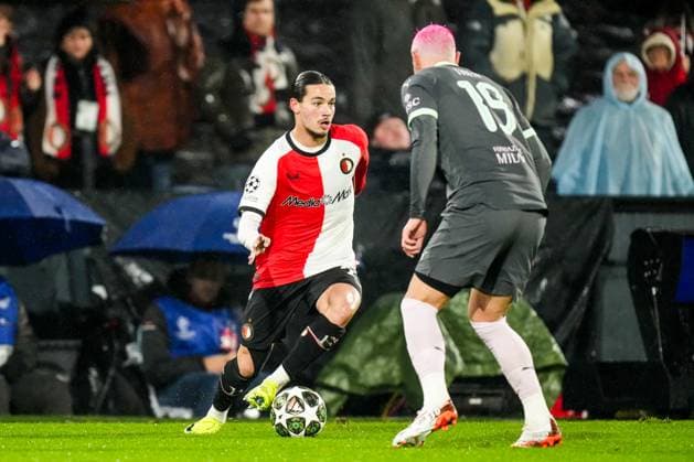 UEFA Champions League: Feyenoord v AC Milan Rotterdam - Anis Hadj Moussa of Feyenoord, Theo Hernandez of AC Milan during the 1st leg of the knockout phase play-offs of new format of the Champions League 2024 2025. The match is set between Feyenoord and AC Milan at Stadion Feijenoord De Kuip on 12 February 2025 in Rotterdam, The Netherlands. Copyright: xYannickxVerhoevenx