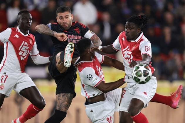 Monaco, Monaco, 12th February 2025. Nicolas Otamendi of SL Benfica clashes with Krepin Diatta, Breel Embolo and Mohammed Salisu of AS Monaco during the UEFA Champions League match at Stade Louis II, Monaco. Picture credit should read: Simon Bellis Sportimage EDITORIAL USE ONLY. No use with unauthorised audio, video, data, fixture lists, club league logos or live services. Online in-match use limited to 120 images, no video emulation. No use in betting, games or single club league player publications. SPI_001_JM_MONACO_BENFICA_UCL_ SPI-3662-0001