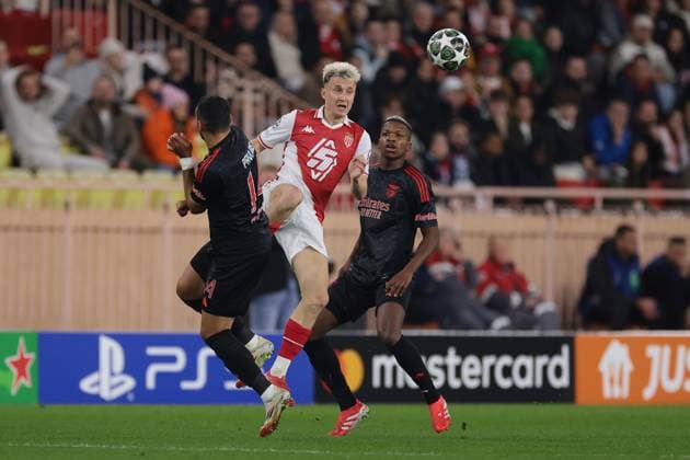 Monaco, Monaco, 12th February 2025. Aleksandr Golovin of AS Monaco clashes with Vangelis Pavlidis of SL Benfica as Florentino of SL Benfica looks on during the UEFA Champions League match at Stade Louis II, Monaco. Picture credit should read: Simon Bellis Sportimage EDITORIAL USE ONLY. No use with unauthorised audio, video, data, fixture lists, club league logos or live services. Online in-match use limited to 120 images, no video emulation. No use in betting, games or single club league player publications. SPI_004_JM_MONACO_BENFICA_UCL_ SPI-3662-0004