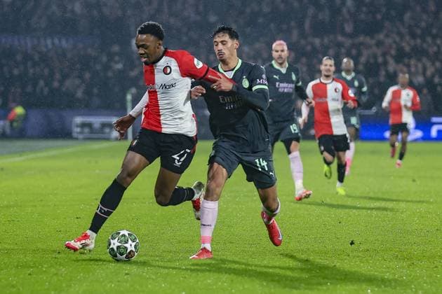 ROTTERDAM, 12-2-2025, Stadium de Kuip, Champions League, 2024 2025, Feyenoord - AC Milan, Feyenoord player Antoni Milambo and AC Milan player Tijjani Reijnders Feyenoord - AC Milan  x27830701x Copyright: