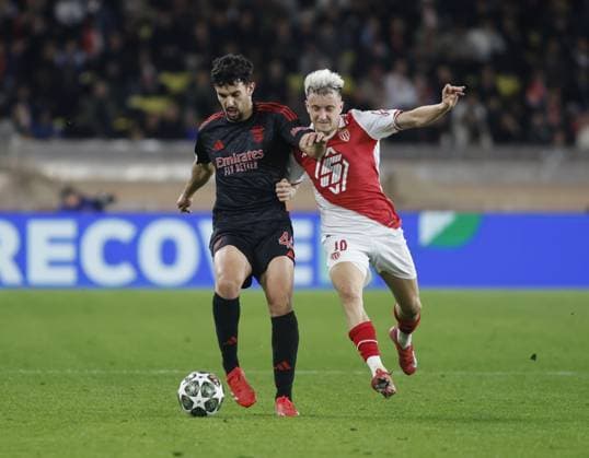 Tomas Araujo of SL Benfica and Aleksander Golovin of AS Monaco during the Uefa Champions League first leg play offâ??s, football match between AS Monaco and SL Benfica. On 12 February 2025 at Louis II Stadium, Monaco. Photo Nderim Kaceli.  Copyright: xNderimxKaceli IPAxSportx xipa-agency.netx xx IPA_53987996 IPA_Agency_IPA53987996