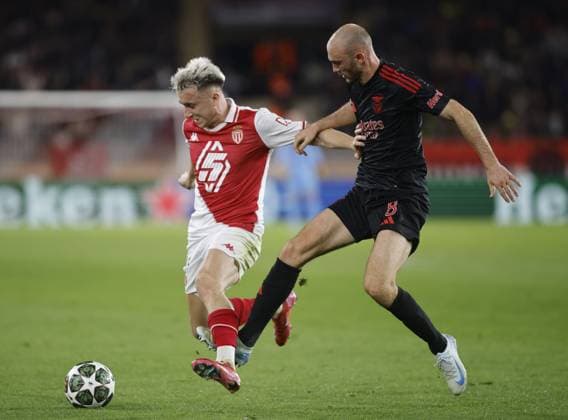 Aleksander Golovin of AS Monaco and Fredrik Aursenes of SL Benfica during the Uefa Champions League first leg play offâ??s, football match between AS Monaco and SL Benfica. On 12 February 2025 at Louis II Stadium, Monaco. Photo Nderim Kaceli.  Copyright: xNderimxKaceli IPAxSportx xipa-agency.netx xx IPA_53988016 IPA_Agency_IPA53988016
