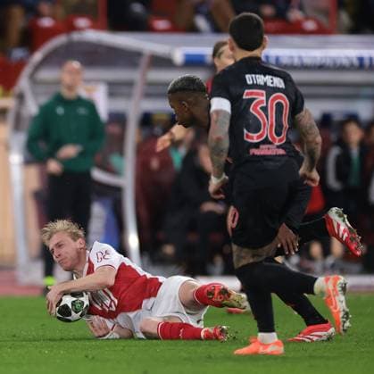 Monaco, Monaco, 12th February 2025. Mika Biereth of AS Monaco grabs the ball as he is bundled to the ground by Florentino of SL Benfica during the UEFA Champions League match at Stade Louis II, Monaco. Picture credit should read: Simon Bellis Sportimage EDITORIAL USE ONLY. No use with unauthorised audio, video, data, fixture lists, club league logos or live services. Online in-match use limited to 120 images, no video emulation. No use in betting, games or single club league player publications. SPI_019_JM_MONACO_BENFICA_UCL_ SPI-3662-0019