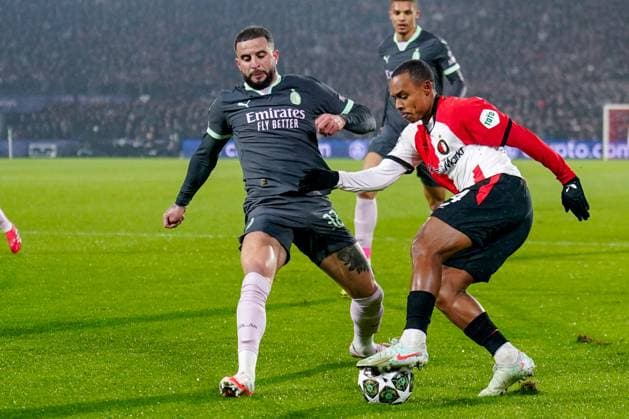 2025-02-12 Feyenoord v AC Milan - UEFA Champions League 2024 25 League Knockout Play-off First Leg ROTTERDAM, NETHERLANDS - FEBRUARY 12: Kyle Walker of AC Milan battles for possession with Igor Paixao of Feyenoord during the UEFA Champions League 2024 25 League Knockout Play-off First Leg match between Feyenoord and AC Milan at Stadion Feijenoord on February 12, 2025 in Rotterdam, Netherlands. Rotterdam Stadion Feijenoord Netherlands Content not available for redistribution in The Netherlands directly or indirectly through any third parties. Copyright: xJorisxVerwijstx