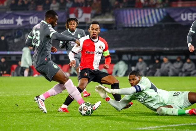 2025-02-12 Feyenoord v AC Milan - UEFA Champions League 2024 25 League Knockout Play-off First Leg ROTTERDAM, NETHERLANDS - FEBRUARY 12: Quinten Timber of Feyenoord battles for possession with Fikayo Tomori of AC Milan, Goalkeeper Mike Maignan of AC Milan during the UEFA Champions League 2024 25 League Knockout Play-off First Leg match between Feyenoord and AC Milan at Stadion Feijenoord on February 12, 2025 in Rotterdam, Netherlands. Rotterdam Stadion Feijenoord Netherlands Content not available for redistribution in The Netherlands directly or indirectly through any third parties. Copyright: xPieterxvanxderxWoudex
