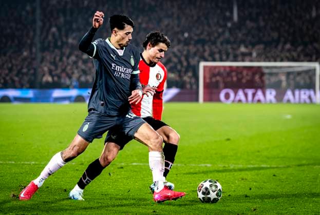 AC Milan midfielder Tijjani Reijnders, Feyenoord Rotterdam defender Hugo Bueno during the match Feyenoord AC Milan at the Stadium De Kuip for the UEFA Champions League Knockout phase play offs1st leg season 2024 2025 in ROTTERDAM, Netherlands on 12 february 2025, photo by Marcel van Dorst EYE4images DeFodi Images Defodi 746 215422 Defodi-746