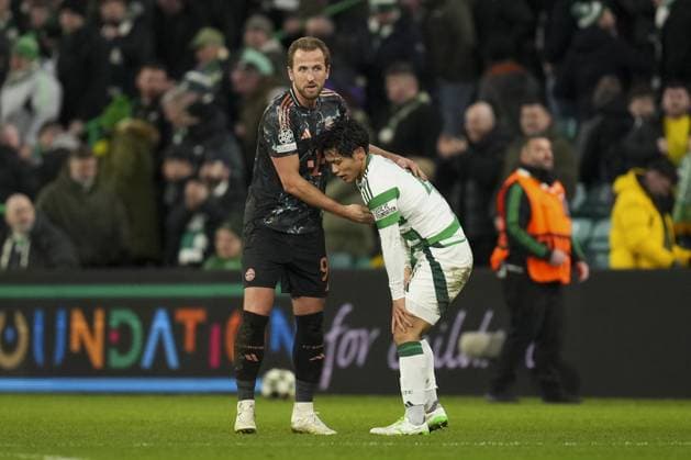 Harry Kane of Bayern Munich pats dejected Reo Hatate of Celtic on the back after final whistle Celtic v Bayern Munich, UEFA Champions League, Knockout Round Play-offs, First Leg, Football, Celtic Park, Glasgow, UK - 12 Feb 2025 EDITORIAL USE ONLY No use with unauthorised audio, video, data, fixture lists, club league logos or live services. Online in-match use limited to 120 images, no video emulation. No use in betting, games or single club league player publications.  Copyright: xStuartxWallace Shutterstockx 15136907ek