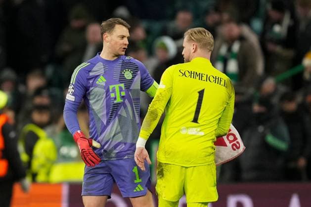 Celtic goalkeeper Kasper Schmeichel and Bayern Munich goalkeeper Manuel Neuer embrace after final whistle Celtic v Bayern Munich, UEFA Champions League, Knockout Round Play-offs, First Leg, Football, Celtic Park, Glasgow, UK - 12 Feb 2025 EDITORIAL USE ONLY No use with unauthorised audio, video, data, fixture lists, club league logos or live services. Online in-match use limited to 120 images, no video emulation. No use in betting, games or single club league player publications.  Copyright: xStuartxWallace Shutterstockx 15136907ew