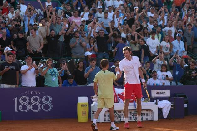 Diego Schwartzman of Argentina greats Nicolas Jarry of Chile after his second round match win at the IEB+ Argentina Open 2025 at Buenos Aires Lawn Tennis Club February 12, 2025 in Buenos Aires, Argentina. (Photo by Camilla Stolen, Imago) Buenos Aires Argentina Copyright: xCamillaxStolenx L1060013