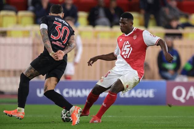 Monaco, Monaco, 12th February 2025. Breel Embolo of AS Monaco passes the ball as Nicolas Otamendi of SL Benfica closes in during the UEFA Champions League match at Stade Louis II, Monaco. Picture credit should read: Simon Bellis Sportimage EDITORIAL USE ONLY. No use with unauthorised audio, video, data, fixture lists, club league logos or live services. Online in-match use limited to 120 images, no video emulation. No use in betting, games or single club league player publications. SPI_043_JM_MONACO_BENFICA_UCL_ SPI-3662-0043