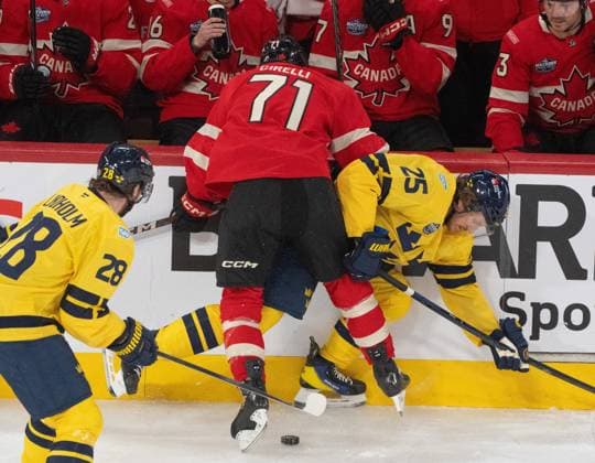 February 12, 2025, Montreal, Pq, CANADA: Sweden defenceman Jonas Brodin (25) is checked into the boards by Canada forward Anthony Cirelli (71) during first period 4 Nations Face-Off hockey action in Montreal on Wednesday, Feb. 12, 2025. Canada News - February 12, 2025  - ZUMAc35_ 20250212_zaf_c35_104 Copyright: xChristinnexMuschix