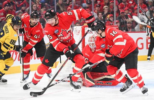 February 12, 2025, Montreal, Pq, Canada: Canada s Colton Parayko (55) clears the puck as Sweden s William Nylander (88) moves in during second period 4 Nations Face-Off hockey action in Montreal, Wednesday, February 12, 2025. Colton Parayko, William Nylander,  - ZUMAc35_ 20250212_zaf_c35_129 Copyright: xGrahamxHughesx