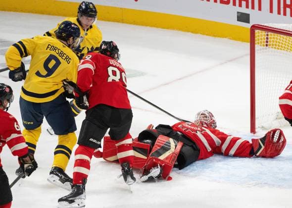 February 12, 2025, Montreal, Pq, CANADA: Canada goaltender Jordan Binnington (50) covers up the puck against Sweden s forwards Filip Forsberg (9) and Gustav Nyquist (12) as Canada defenceman Drew Doughty (89) defends during second period 4 Nations Face-Off hockey action in Montreal on Wednesday, Feb. 12, 2025. Canada News - February 12, 2025  - ZUMAc35_ 20250212_zaf_c35_128 Copyright: xChristinnexMuschix