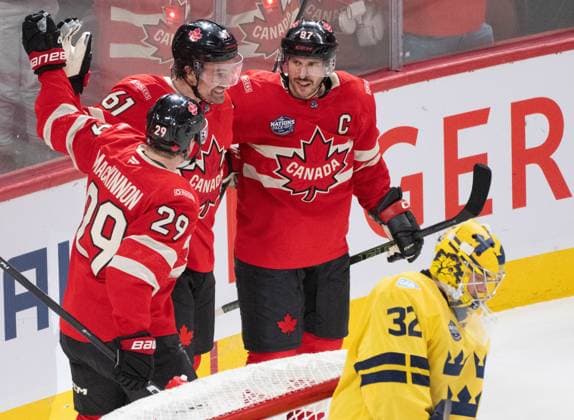 February 12, 2025, Montreal, Pq, CANADA: Canada forward Mark Stone (61) celebrates his goal over Sweden goaltender Filip Gustavsson (32) with Nathan MacKinnon (29) and Sidney Crosby (87) during second period 4 Nations Face-Off hockey action in Montreal on Wednesday, Feb. 12, 2025. Canada News - February 12, 2025  - ZUMAc35_ 20250212_zaf_c35_140 Copyright: xChristinnexMuschix