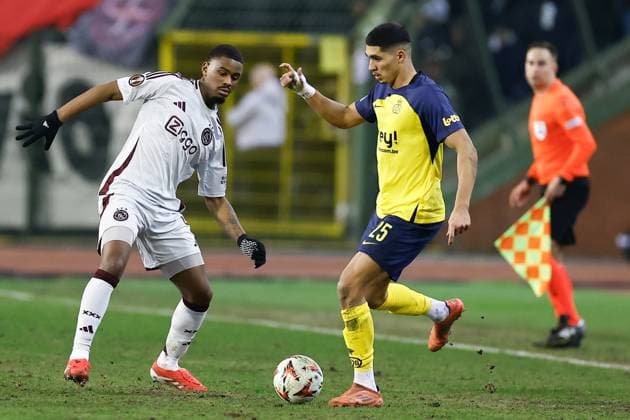 BRUSSELS, 13-02-2025, King Boudewijn Stadium, Europa League match first leg between Union Saint Gilloise and Ajax. Union Saint-Gilloise player Anan Khalaili and Ajax player Jorrel Hato Union Saint Gilloise - Ajax  x27844413x Copyright: