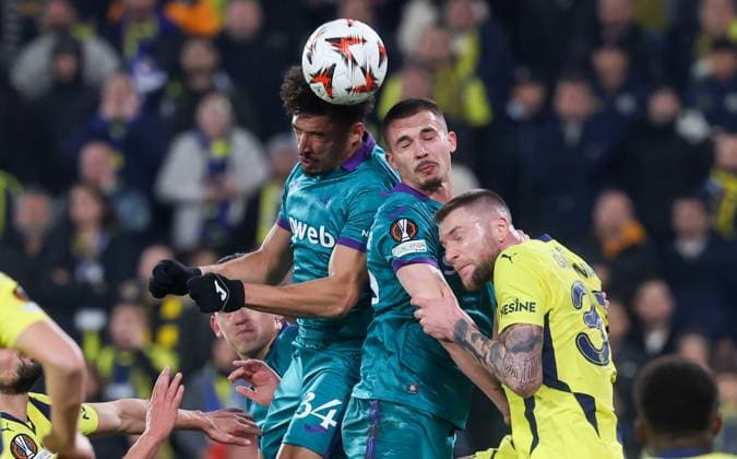 Anderlecht s Adryelson, Anderlecht s Leander Dendoncker and Fenerbahce s Milan Skriniar fight for the ball during a soccer game between Turkish Fenerbahce SK and Belgian RSC Anderlecht, on Thursday 13 February 2025 in Istanbul, Turkey, the first leg of the Knockout phase play-offs of the UEFA Europa League competition. VIRGINIExLEFOUR  x112378340x