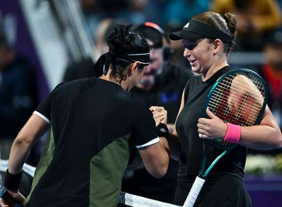 QATAR TOTALENERGIES OPEN - QUARTER-FINALS Jelena Ostapenko (R) of Latvia greets Ons Jabeur of Tunisia after winning the quarterfinals match of the WTA, Tennis Damen Qatar TotalEnergies Open 2025 tennis tournament at the Khalifa International Tennis Complex in Doha, Qatar, on February 13, 2025. DOHA Qatar Copyright: xNOUSHADx