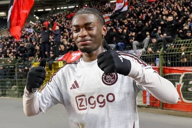 BRUSSELS, 13-02-2025, King Boudewijn Stadium, Europa League match first leg between Union Saint Gilloise and Ajax. Ajax player Jorthy Mokio with the Ajax fans on the background after the match Union Saint Gilloise - Ajax  x27845882x Copyright: