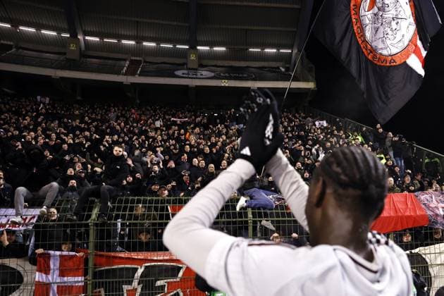 BRUSSELS - Jorthy Mokio of Ajax celebrates the 0-2 victory with supporters after the Europa League playoff match between Royale Union Saint-Gilloise and Ajax Amsterdam at the King Baudouin Stadium on Feb. 13, 2025 in Brussels, Belgium. ANP MAURICE VAN STEEN UEFA Europa League 2024 25 League Knockout Play-off First Leg 2024 25 xVIxANPxSportx xxANPxIVx 519904622 originalFilename: 519904622.jpg