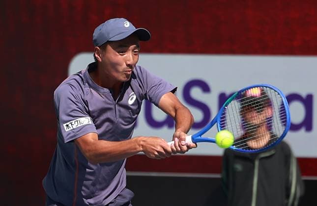 February 14, 2025, New Delhi, Delhi, India: Shintaro Mochizuki of Japan during Quarter Finals of ATP, Tennis Herren Challenger Delhi Open 2025 between Vit Kopriva of Czechia and Shintaro Mochizuki of Japan at DLTA Complex, R K Khanna Tennis Stadium, New Delhi, India on 14 February 2025 New Delhi India - ZUMAd207 20250214_zsp_d207_027 Copyright: xAvijitxDasx
