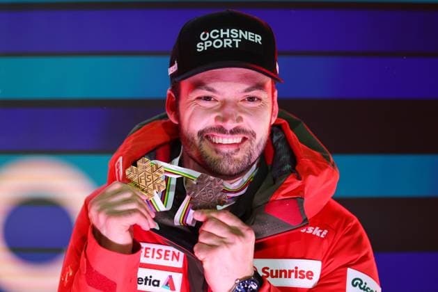 ALPINE SKIING - FIS Ski WC Saalbach 2025 SAALBACH,AUSTRIA,14.FEB.25 - ALPINE SKIING - FIS Alpine World Ski Championships Saalbach 2025, giant slalom, men, medal plaza, award ceremony. Image shows the rejoicing of Loic Meillard (SUI). Keywords: medal.  GEPAxpictures xThomasxBachun