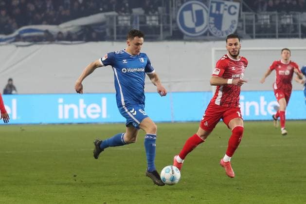 14 02 2025, xgox, Soccer 2 Bundesliga, 1 FC Magdeburg 1 FC Koeln emspor, v l Martijn Kaars Magdeburg, 9 DFL DFB REGULATIONS PROHIBIT ANY USE OF PHOTOGRAPHS as IMAGE SEQUENCES and or QUASI VIDEO Magdeburg