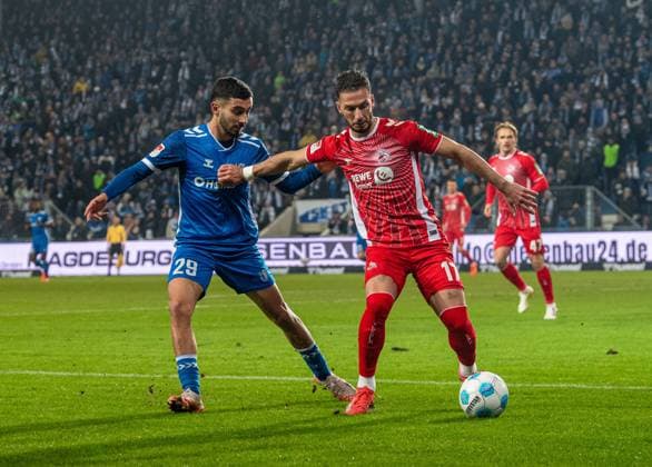 Soccer, Men, Season 2024 2025, 2 Bundesliga 22 Matchday , 1 FC Magdeburg 1 FC Köln, v l Livan Burcu 1 FC Magdeburg , Leart Paqarada 1 FC Köln , 14 02 2025, Copyright: xSebastianxRäppold MatthiasxKochx