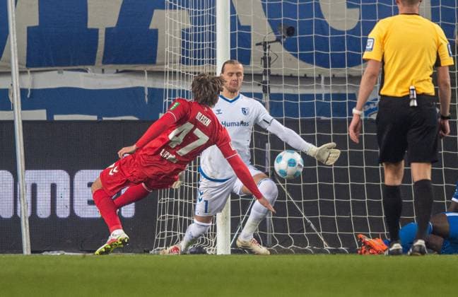 Soccer, Men, Season 2024 2025, 2 Bundesliga 22 Matchday , 1 FC Magdeburg 1 FC Köln, Goalkeeper Dominik Reimann 1 FC Magdeburg holds a shot from Mathias Olesen 1 FC Köln , 14 02 2025, Copyright: xSebastianxRäppold MatthiasxKochx