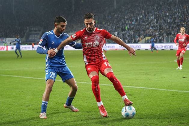 14 02 2025, xgox, Soccer 2 Bundesliga, 1 FC Magdeburg 1 FC Koeln emspor, v l Livian Burcu Magdeburg, 29 , Leart Pacarada Koeln, 17 DFL DFB REGULATIONS PROHIBIT ANY USE OF PHOTOGRAPHS as IMAGE SEQUENCES and or QUASI VIDEO Magdeburg