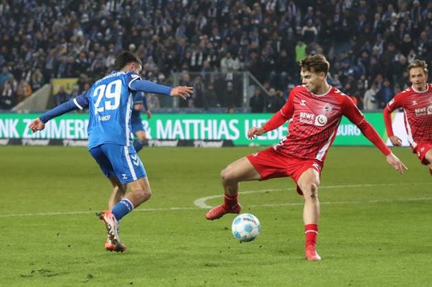 14 02 2025, xgox, Soccer 2 Bundesliga, 1 FC Magdeburg 1 FC Koeln emspor, v l Livian Burcu Magdeburg, 29 , Jan Thielmann Koeln, 29 DFL DFB REGULATIONS PROHIBIT ANY USE OF PHOTOGRAPHS as IMAGE SEQUENCES and or QUASI VIDEO Magdeburg
