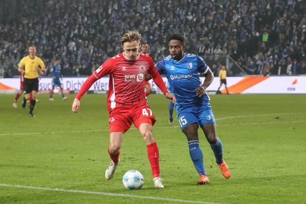 14 02 2025, xgox, Soccer 2 Bundesliga, 1 FC Magdeburg 1 FC Koeln emspor, v l Mathias Olsen Koeln, 47 , Daniel Heber Magdeburg, 15 DFL DFB REGULATIONS PROHIBIT ANY USE OF PHOTOGRAPHS as IMAGE SEQUENCES and or QUASI VIDEO Magdeburg