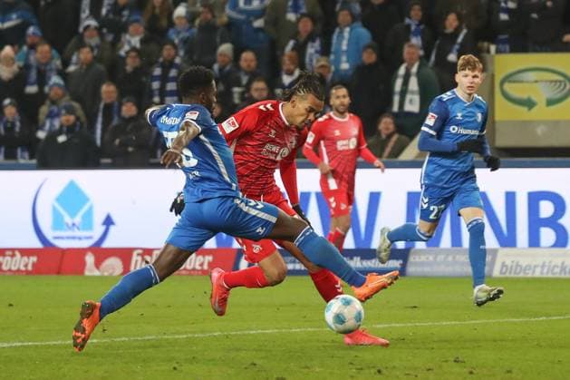 14 02 2025, xgox, Soccer 2 Bundesliga, 1 FC Magdeburg 1 FC Koeln emspor, v l Daniel Heber Magdeburg, 15 , Damion Downs Koeln, 42 DFL DFB REGULATIONS PROHIBIT ANY USE OF PHOTOGRAPHS as IMAGE SEQUENCES and or QUASI VIDEO Magdeburg