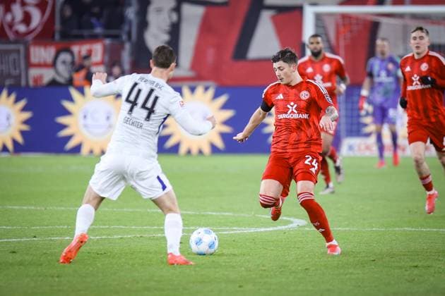 2 Soccer Bundesliga, Fortuna Düsseldorf vs Hertha BSC Berlin, 15 02 2025 Dawid Kownacki Fortuna Düsseldorf 24 and Linus Gechter Hertha BSC Berlin 44 DFL REGULATIONS PROHIBIT ANY USE OF PHOTOGRAPHS AS IMAGE SEQUENCES AND OR Q UASI VIDEO 2 Soccer Bundesliga, Fortuna Düsseldorf vs Hertha BSC Berlin, 15 02 2025 Copyright: xBEAUTIFULxSPORTS Derixx