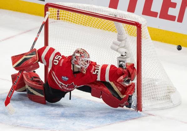 Eishockey, 4 Nations Face-Off in Montreal, Kanada - USA February 15, 2025, Montreal, Pq, CANADA: Canada goaltender Jordan Binnington (50) stretches to make a save against the United States during first period 4 Nations Face-Off hockey action in Montreal on Saturday, Feb. 15, 2025. Canada News - February 15, 2025  - ZUMAc35_ 20250215_zaf_c35_221 Copyright: xChristinnexMuschix