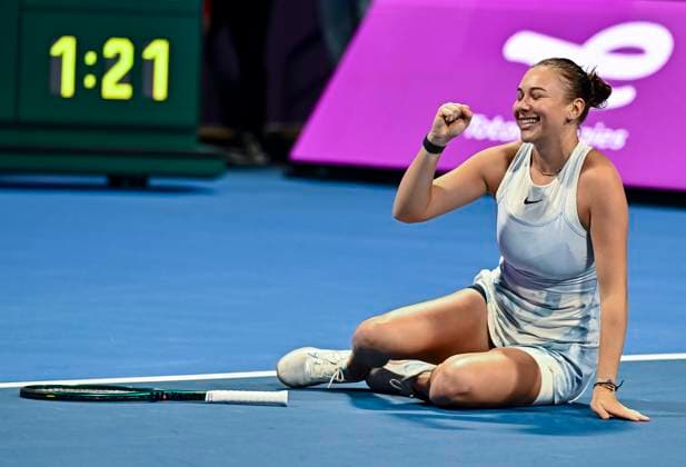 (250216) -- DOHA, Feb. 16, 2025 -- Amanda Anisimova of the United States celebrates after winning the women s singles final match between Jelena Ostapenko of Latvia and Amanda Anisimova of the United States at the WTA, Tennis Damen Qatar Open tennis tournament in Doha, Qatar, on Feb. 15, 2025. (Photo by Xinhua) (SP)QATAR-DOHA-WTA QATAR OPEN 2025-WOMEN S SINGLES FINAL Nikku 