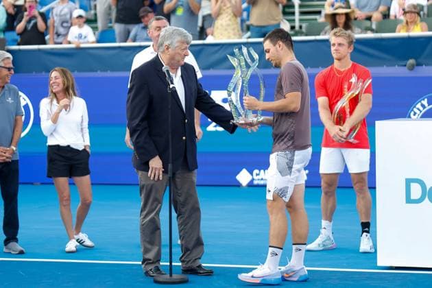 DELRAY BEACH, FL - FEBRUARY 16: Miomir Kecmanovic (SRB) receives the winners trophy at the Mens Singles Final of the Delray Beach Open on February 16, 2025, at Delray Beach Stadium & Tennis Center in Delray Beach, Florida.(Photo by Chris Arjoon Icon Sportswire). TENNIS: FEB 16 Delray Beach Open EDITORIAL USE ONLY Icon25021600110
