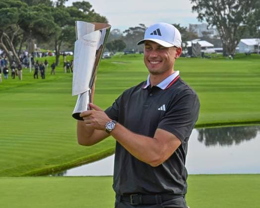 February 16, 2025: Ludvig Aberg holds the championship trophy after winning the Genesis Invitational on Torrey Pines South Course in San Diego, California. CSM San Diego USA - ZUMAc04_ 20250216_zma_c04_036 Copyright: xJustinxFinex