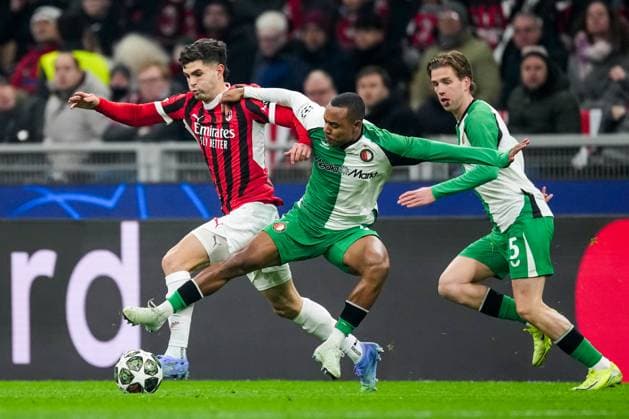 UEFA Champions League: AC Milan v Feyenoord Milan - Christian Pulisic of AC Milan, Igor Paixao of Feyenoord during the 2nd leg of the knockout phase play-offs of new format of the Champions League 2024 2025. The match is set between AC Milan and Feyenoord at Giuseppe Meazza San Siro on 18 February 2025 in Milan, Italy. Copyright: xTomxBodex
