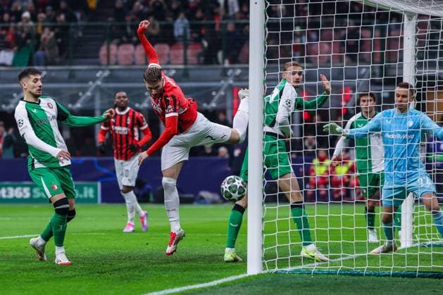 CALCIO - UEFA Champions League - AC Milan vs Feyernood Santiago Gimenez of AC Milan scores a goal during UEFA Champions League 2024 25 Knockout phase play-offs 2nd leg football match between AC Milan and Feyenoord Rotterdam at San Siro Stadium Milan Italy  Copyright: xIPAxSport ABACAx