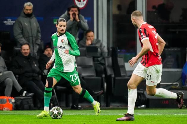 UEFA Champions League: AC Milan v Feyenoord Milan - Anis Hadj Moussa of Feyenoord, Strahinja Pavlovic of AC Milan during the 2nd leg of the knockout phase play-offs of new format of the Champions League 2024 2025. The match is set between AC Milan and Feyenoord at Giuseppe Meazza San Siro on 18 February 2025 in Milan, Italy. Copyright: xYannickxVerhoevenx