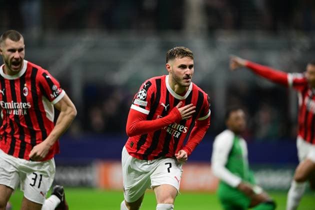 AC Milan v Feyenoord - UEFA Champions League 2024 25 League Knockout Play-off Second Leg Santiago Gimenez of AC Milan celebrates after scoring his team s first goal during the round of 16 UEFA Champions League match between AC Milan and Feyenoord Rotterdam at San Siro Stadium in Milan, Italy, on February 18, 2025. Milan Lombardy Italy  Copyright: xAndreaxDiodatox originalFilename:diodato-acmilanv250218_np5sN.jpg