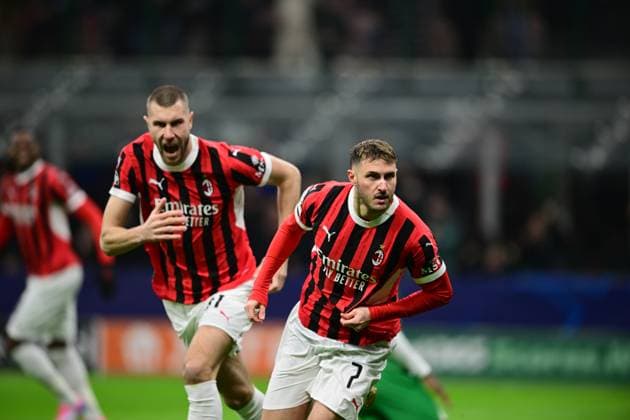 AC Milan v Feyenoord - UEFA Champions League 2024 25 League Knockout Play-off Second Leg Santiago Gimenez of AC Milan celebrates after scoring his team s first goal during the round of 16 UEFA Champions League match between AC Milan and Feyenoord Rotterdam at San Siro Stadium in Milan, Italy, on February 18, 2025. Milan Lombardy Italy  Copyright: xAndreaxDiodatox originalFilename:diodato-acmilanv250218_npZB4.jpg